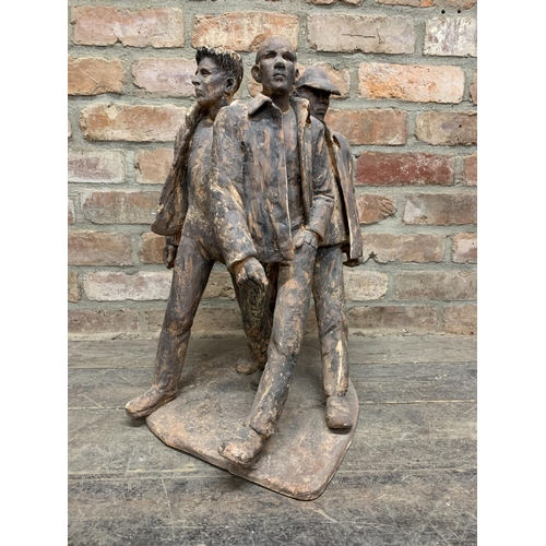 634 - Deborah McCabe (20th/21st century) - Three walking figures, terracotta sculpture, 60cm high