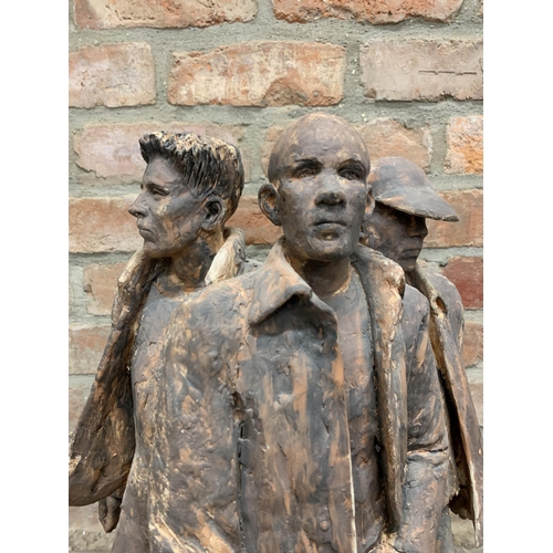 634 - Deborah McCabe (20th/21st century) - Three walking figures, terracotta sculpture, 60cm high