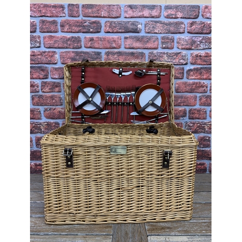 2334 - Impressive wicker picnic hamper with leather handle and buckle finish, fitted interior to include pl... 