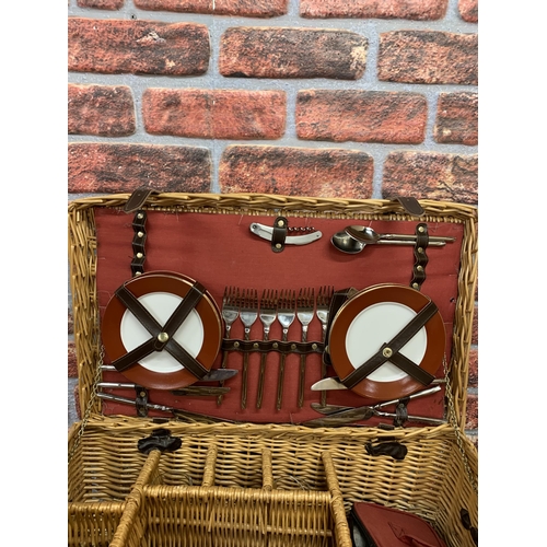 2334 - Impressive wicker picnic hamper with leather handle and buckle finish, fitted interior to include pl... 