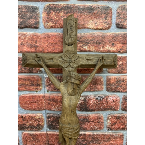 2198 - Hand carved wooden Folk Art crucifix, L 67cm