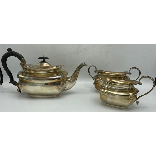 178 - Edwardian Georgian style silver boat shaped three piece tea service, teapot milk jug and sucrier, ma... 