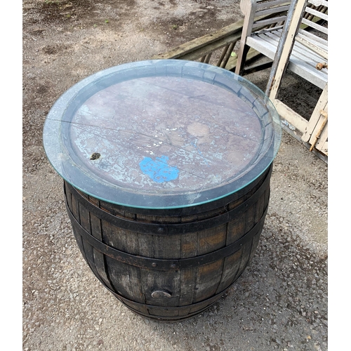 1003 - Vintage wrought iron bound coopered oak barrel with glass top, H 87cm x W 65cm approx