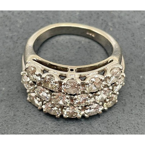 64 - 14ct white gold diamond cluster ring, set with sixteen .20ct stones, size I, 10.1g