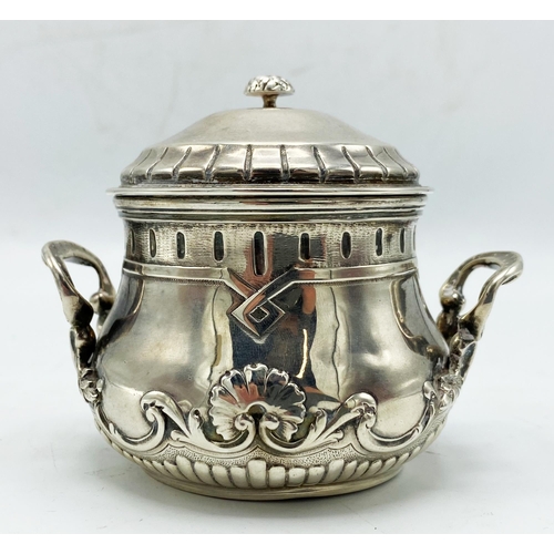 114 - Continental silver lidded sugar or salt cauldron, with embossed aesthetic decoration, 9cm high, 4.5o... 