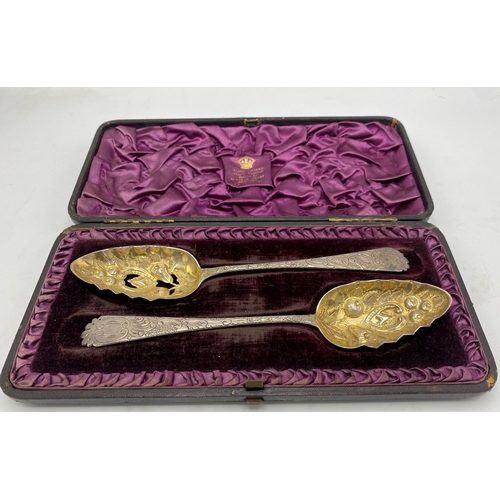150 - Cased pair of George III silver berry spoons, maker William Eley?, London 1803, 4.3oz approx