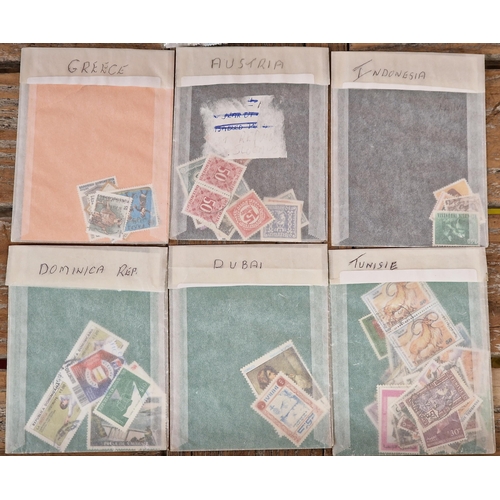 2557 - Segmented index box containing mint World and GB stamps in bags and wallets and collection of mint p... 