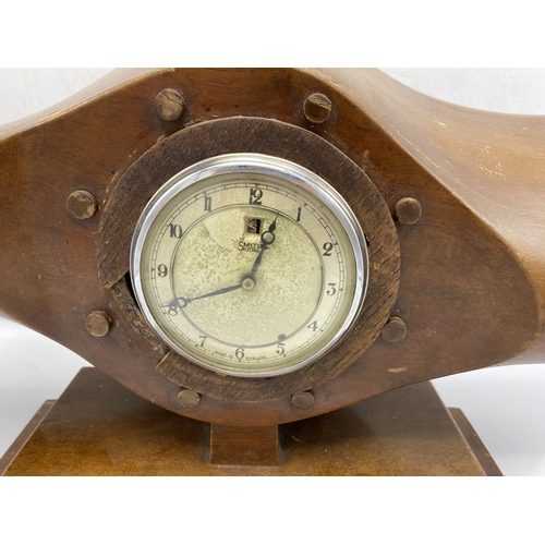 261 - Vintage propeller teak mantle clock, inscribed 'R. 316 7/41', fitted with a Smiths Electric clock, H... 