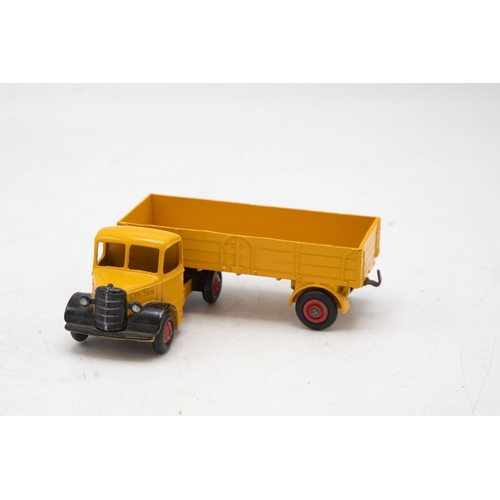 3017 - Dinky Toys No. 921 Articulated Lorry. Yellow Bedford. Model very near mint - a bright example in an ... 