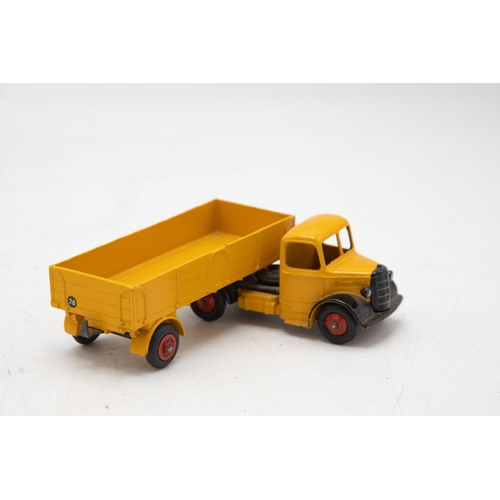 3017 - Dinky Toys No. 921 Articulated Lorry. Yellow Bedford. Model very near mint - a bright example in an ... 