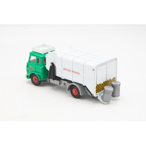 3018 - Dinky Supertoys 978. Refuse Wagon with fore and aft tipping actions. Just like the real thing! Two d... 