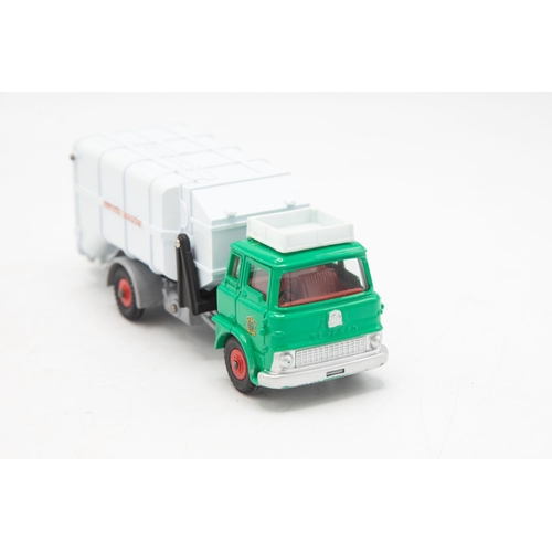 3018 - Dinky Supertoys 978. Refuse Wagon with fore and aft tipping actions. Just like the real thing! Two d... 