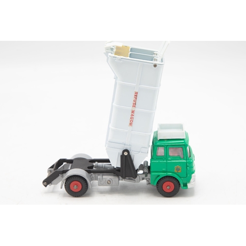 3018 - Dinky Supertoys 978. Refuse Wagon with fore and aft tipping actions. Just like the real thing! Two d... 