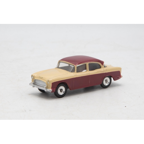 3049 - Dinky Toys 165 Humber Hawk, maroon and beige, correct box two-tone colour spot, very near mint and b... 