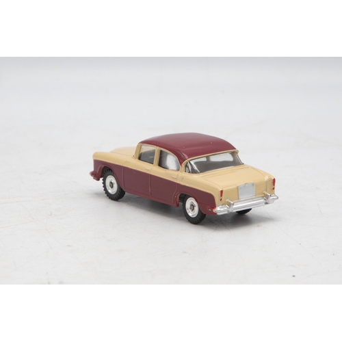 3049 - Dinky Toys 165 Humber Hawk, maroon and beige, correct box two-tone colour spot, very near mint and b... 