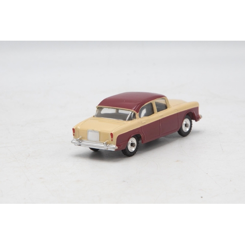 3049 - Dinky Toys 165 Humber Hawk, maroon and beige, correct box two-tone colour spot, very near mint and b... 