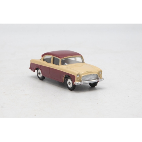 3049 - Dinky Toys 165 Humber Hawk, maroon and beige, correct box two-tone colour spot, very near mint and b... 