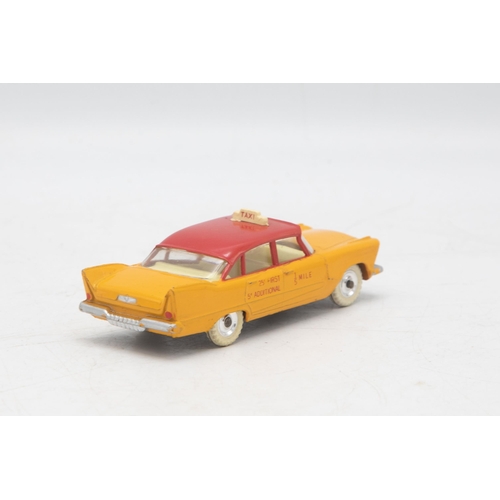 3057 - Dinky Toys 265 Plymouth U.S.A Taxi, Plymouth Plaza, near mint and boxed