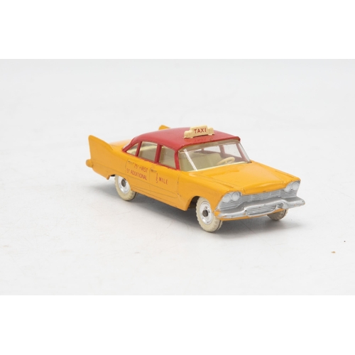 3057 - Dinky Toys 265 Plymouth U.S.A Taxi, Plymouth Plaza, near mint and boxed