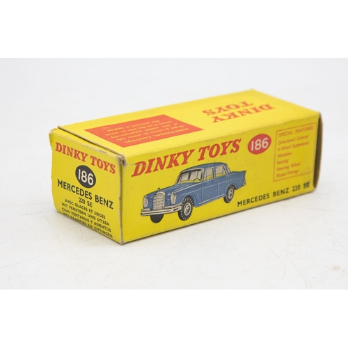 3064 - Dinky Toys 186 Mercedes-Benz 220 SE, grey/blue, bonnet crest intact, clean box one crease, rear fins... 