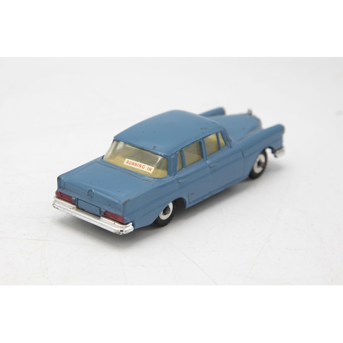 3064 - Dinky Toys 186 Mercedes-Benz 220 SE, grey/blue, bonnet crest intact, clean box one crease, rear fins... 