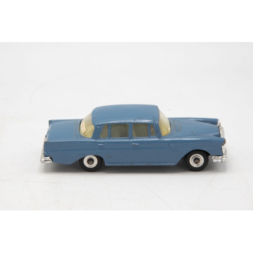 3064 - Dinky Toys 186 Mercedes-Benz 220 SE, grey/blue, bonnet crest intact, clean box one crease, rear fins... 