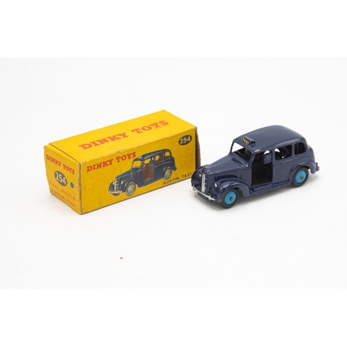 3072 - Dinky Toys 254 Austin Taxi, blue, correct colour spot on box, five very minor chips, excellent and b... 