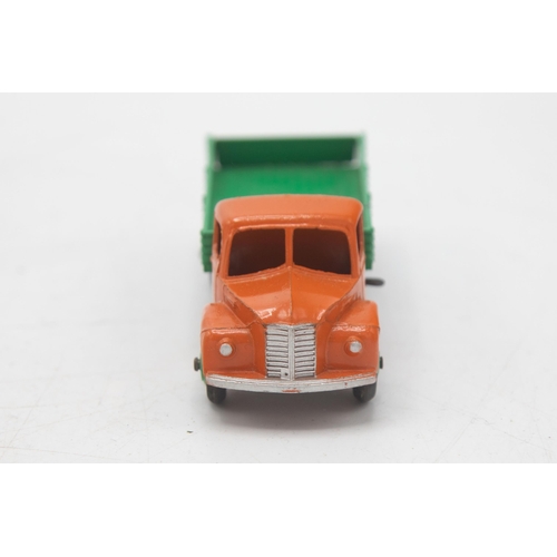 3100 - Dinky Toys 414  Rear Tipping Wagon, flaps missing one end, correct colour spot on the other, mint an... 