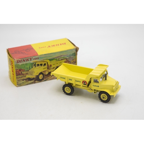 3104 - Dinky Toys 965 Euclid Rear Dump Truck, late picture box showing a forest clearing construction site,... 