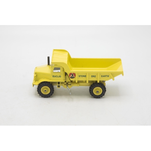 3104 - Dinky Toys 965 Euclid Rear Dump Truck, late picture box showing a forest clearing construction site,... 