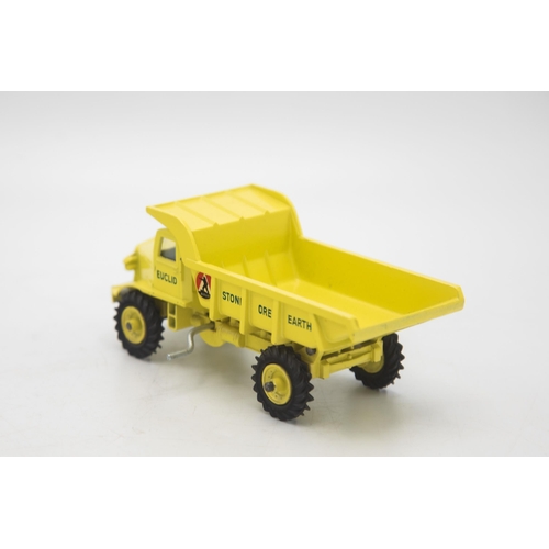 3104 - Dinky Toys 965 Euclid Rear Dump Truck, late picture box showing a forest clearing construction site,... 