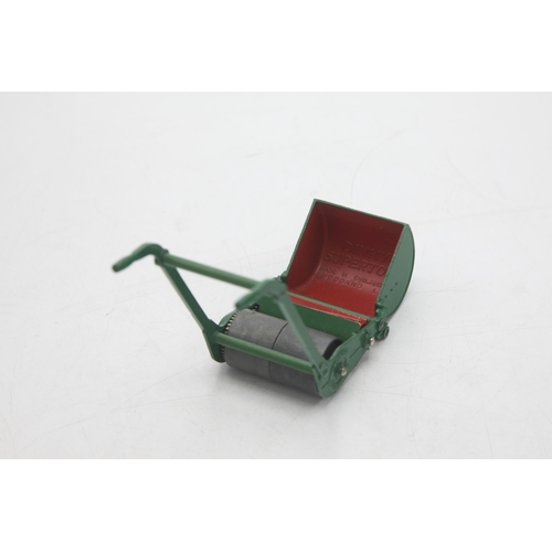 3114 - Dinky Supertoys 751 Lawn Mower, a delight when placed on a flat surface and moved, the revolving bla... 