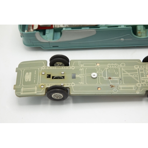 3135 - Mettoy Playthings Luxury Motor Coach 920, push n'go flywheel motor, plastic body, tin-plate removabl... 