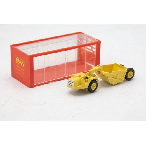 3140 - Dinky Toys mini Dinky Michigan Scraper 98,  model is mint, 1/64 scale, garage 'box' strap-downs miss... 