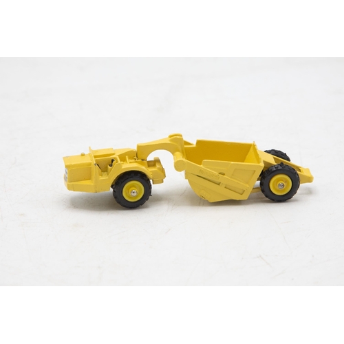 3140 - Dinky Toys mini Dinky Michigan Scraper 98,  model is mint, 1/64 scale, garage 'box' strap-downs miss... 