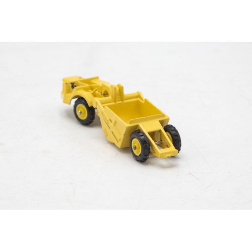 3140 - Dinky Toys mini Dinky Michigan Scraper 98,  model is mint, 1/64 scale, garage 'box' strap-downs miss... 