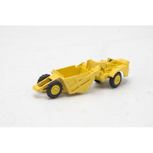 3140 - Dinky Toys mini Dinky Michigan Scraper 98,  model is mint, 1/64 scale, garage 'box' strap-downs miss... 