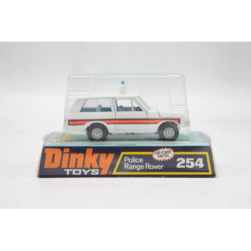 3157 - Dinky Toys 254 Police Range Rover, 1973 number-plate, new old shop stock, mint and plinth bubble box... 