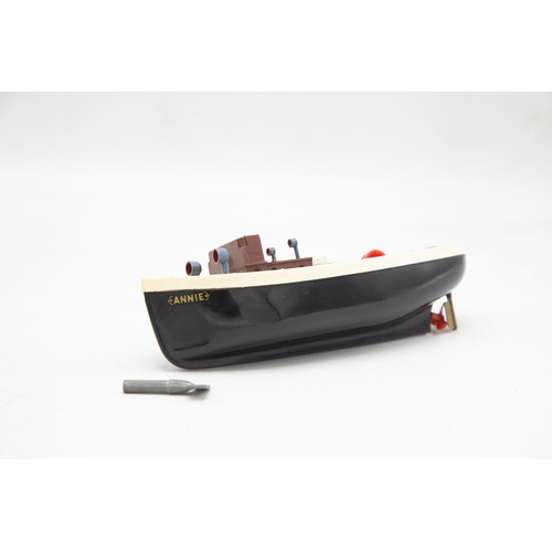 3164 - Penguin Series Clockwork Powered Tugboat 'Annie', funnel present, original Penguin key present, all ... 