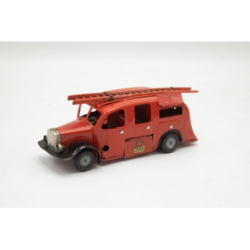 3172 - Tri-ang Minic Fire Engine 62M, clockwork (working), red and black paintwork, all transfers excellent... 