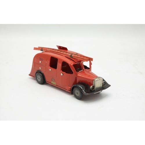 3172 - Tri-ang Minic Fire Engine 62M, clockwork (working), red and black paintwork, all transfers excellent... 