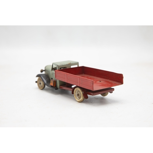 3184 - Tri-ang Minic 25M pre-war Delivery Lorry,'Shell' petrol can on running board, red back grey cab, mis... 