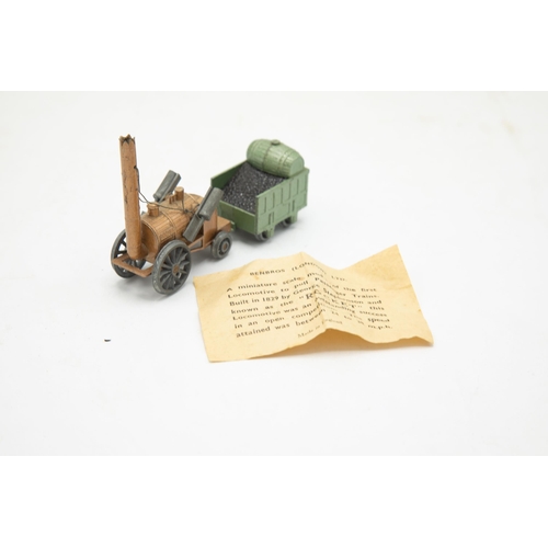 3212 - Benbros Qualitoy Stephenson's Rocket, gold Locomotive with green Coal Tender, 10cm long, containing ... 