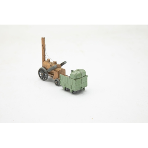 3212 - Benbros Qualitoy Stephenson's Rocket, gold Locomotive with green Coal Tender, 10cm long, containing ... 