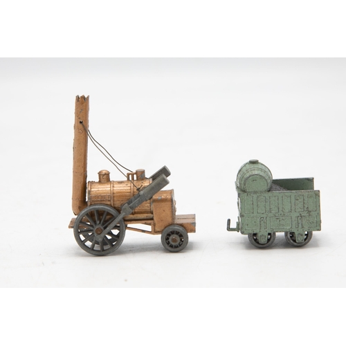 3212 - Benbros Qualitoy Stephenson's Rocket, gold Locomotive with green Coal Tender, 10cm long, containing ... 