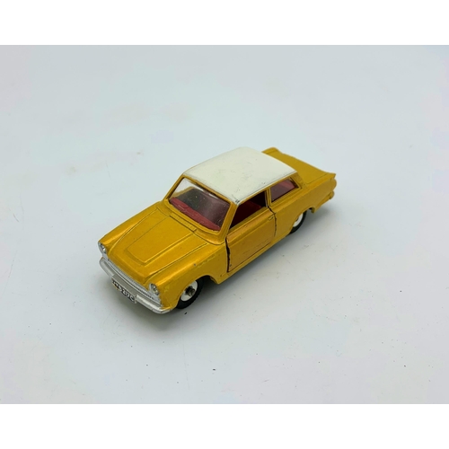 3221 - Dinky Toys No.133, 1965 Ford Cortina, metallic gold white roof, jewelled lights, paper number-plates... 