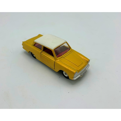 3221 - Dinky Toys No.133, 1965 Ford Cortina, metallic gold white roof, jewelled lights, paper number-plates... 