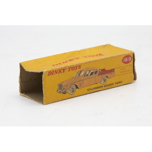 3229 - Dinky Toys 169 Studebaker Golden Hawk, two tone red and beige body, missing end flaps one end, corre... 