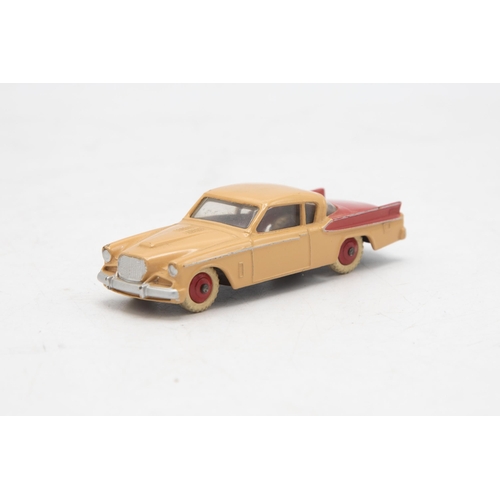 3229 - Dinky Toys 169 Studebaker Golden Hawk, two tone red and beige body, missing end flaps one end, corre... 