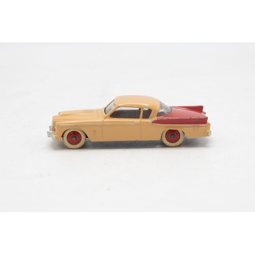 3229 - Dinky Toys 169 Studebaker Golden Hawk, two tone red and beige body, missing end flaps one end, corre... 